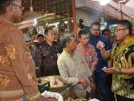 peresmian-implementasi-qris-bersama-wakil-wali-kota-padang-hendri-septa.jpg
