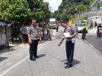 personel-satlantas-polresta-padang-melakukan-olah-tkp-kecelakaan-di-jalan-padang.jpg