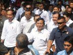 presiden-joko-widodo-berjalan-bersama-calon-presiden-prabowo-subianto-usai-mencoba-kereta-mrt.jpg