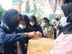puluhan-massa-aksi-yang-tergabung-dalam-berbagai-elemen-dari-mahasiswa.jpg