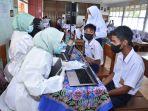 satgas-covid-19-bekerjasama-dengan-polres-agam-melakukan-kegiatan-gebyar-vaksin.jpg