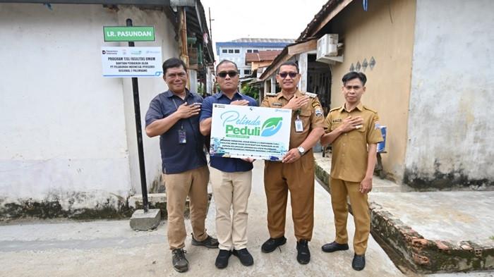 Pelindo Regional 2 Palembang Salurkan Bantuan Perbaikan Jalan di Kelurahan Lawang Kidul