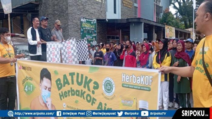 Ribuan Warga Seberang Ulu I Ikuti Jalan Sehat yang Digelar Pemkot Palembang, Sripo dan Tribun Sumsel