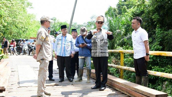 Bupati Hendra Gunawan Pastikan Tahun 2020 Jembatan Poros Trans SP5  Muarakelingi Dibangun Permanen