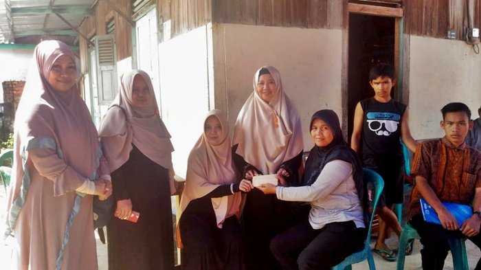 Komunitas Muslimah Palembang Sambangi Dua Lokasi Kebakaran