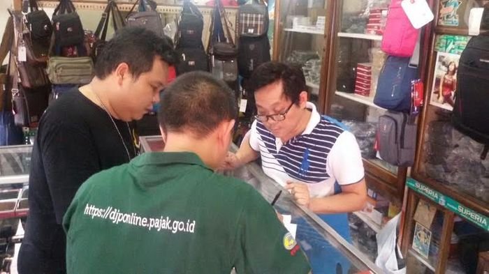 Pedagang di Pasar 16 Ilir Kaget Didatangi Petugas Pajak