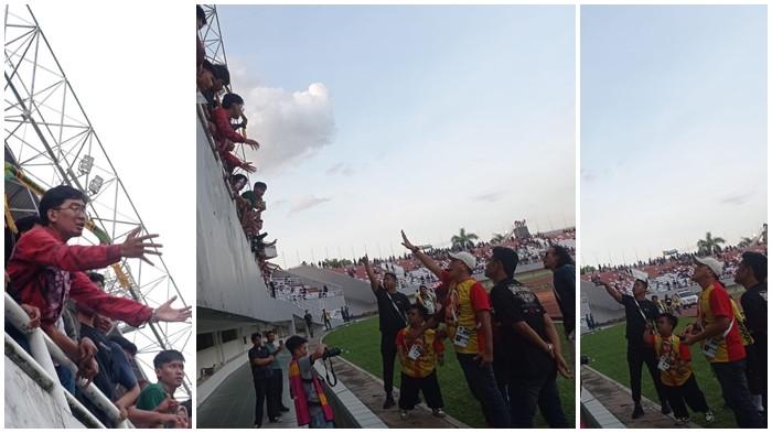 VIRAL KRITIK MANAJEMEN - Seorang fans Sriwijaya FC berbaju batik merah terlihat meluapkan kekecewaannya dari tribun barat Stadion Gelora Sriwijaya Jakabaring Palembang usai kalah atas Adhyaksa FC Banten 0-1, Jumat (7/11/2025) sore. Ia berdebat langsung dengan Wakil Presiden SFC, Mohammad David, yang mendekati pinggir lapangan.