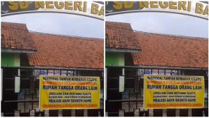 Kepala-Sekolah-merusakan-rumah-tangga-orang-lain-terpasang-di-pagar-sebuah-SD.jpg