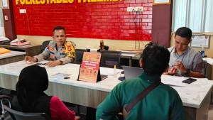 sopian-melapor-ke-spkt-polrestabes-palembang.jpg