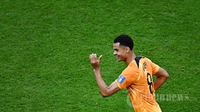 Penyerang-Belanda-Cody-Gakpo-merayakan-gol-pertama-timnya.jpg
