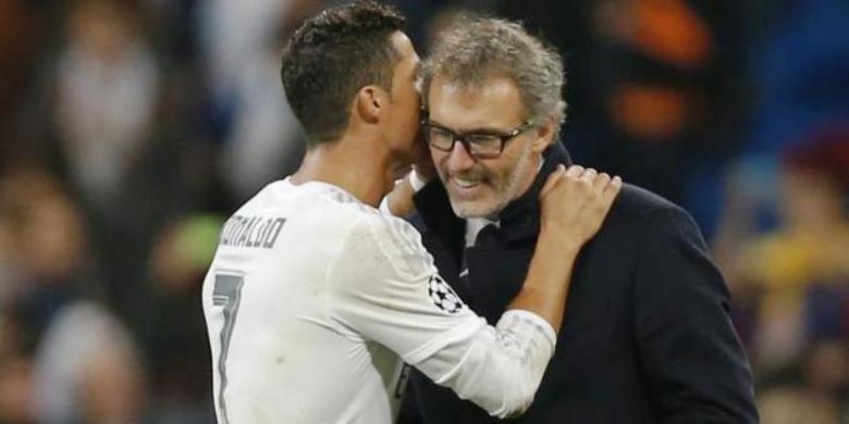 ronaldo-peluk-laurent-blanc_20151126_071943.jpg
