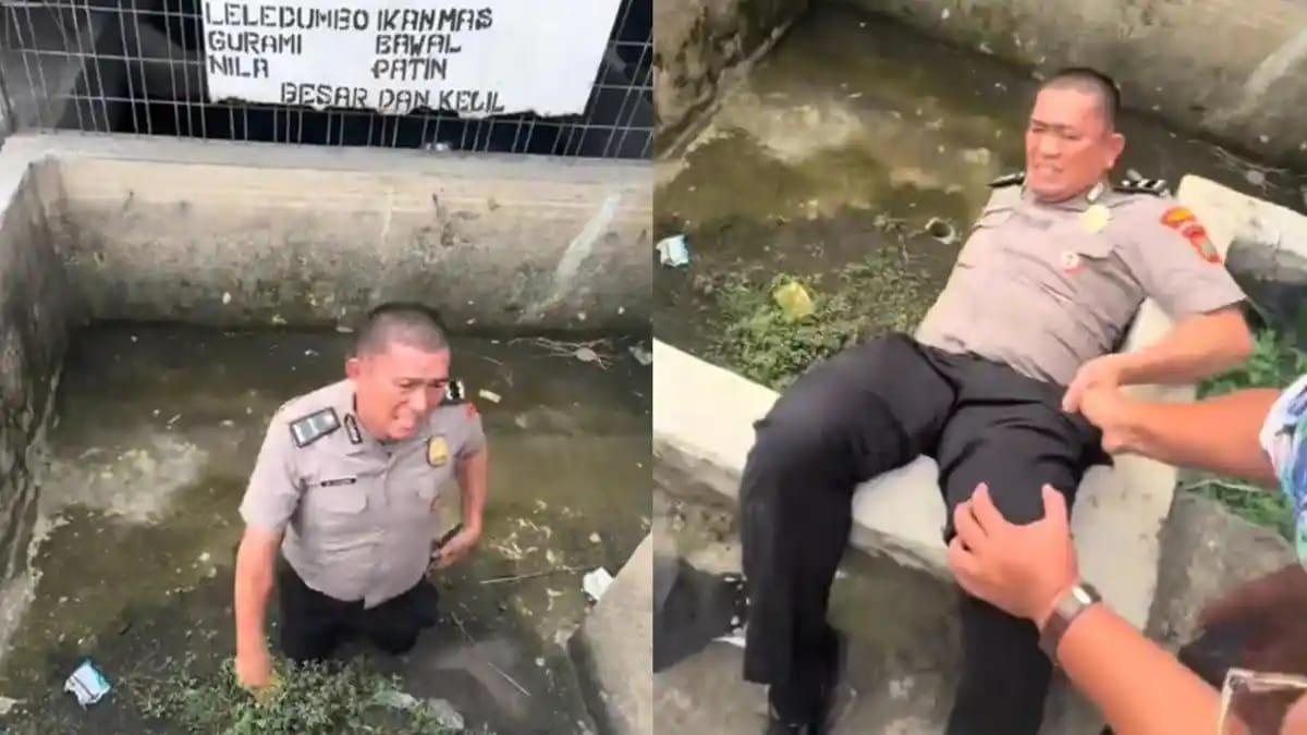seorang-pria-berseragam-Polisi-lengkap-terlibat-cekcok-hingga-ke-luar-Polda.jpg