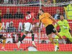 Bek-Wolves-blok-tandukan-striker-Man-United-Rashford.jpg
