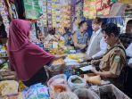 Bulog-Sumsel-Babel-bersama-dinas-terkait-melakukan-peninjauan-harga-beras.jpg