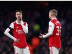 Ekspresi-pemain-Arsenal-Fabio-Vieira-dan-Oleksandr-Zinchenko.jpg