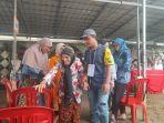 Fatimah-yang-sudah-berusia-97-tahun-tetap-semangat-menuju-TPS.jpg