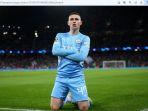 Gelandang-Manchester-City-Phil-Foden-merayakan-golnya-ke-gawang-Real-Madrid.jpg
