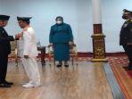 Herman-Deru-kiri-melantik-Pj-Bupati-Musi-Banyuasin-Apriyadi.jpg