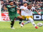 Kapten-Sriwijaya-FC-Amirul-Mukminin-saat-berduel-dengan-pemain-PSMS-Medan-Minggu-1892022.jpg