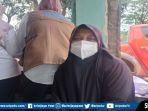 Komala-42-warga-terdekat-dengan-gunung-sampah-TPA-Sukawinatan.jpg