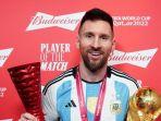Lionel-Messi-bersama-trofi-Piala-Dunia-2022.jpg