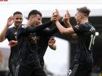 Pemain-Arsenal-rayakan-gol-ke-gawang-Fulham.jpg