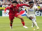 Pemain-Liverpool-Trent-Alexander-Arnold-berduel-dengan-winger-Real-Madrid-Vinicius-Jr.jpg