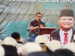 Pj-Bupati-Banyuasin-Hani-Syopiar-Rustam-memberikan-bonus-kepada-atlet.jpg