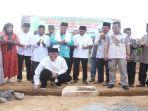 Pj-Bupati-OKU-Teddy-Meilwansyah-meletakkan-batu-pertama-pembangunan-RKB-MAN-1-OKU-dan-MTSN-1.jpg