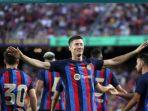Selebrasi-penyerang-Barcelona-Robert-Lewandowski-usai-mencetak-gol-ke-gawang-Pumas.jpg