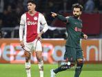Striker-Liverpool-Mohamed-Salah-kanan-merayakan-mencetak-gol-pertama.jpg