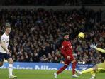 Striker-Liverpool-Mohamed-Salah-tengah-mencetak-gol-kedua-timnya.jpg