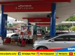 aktivitas-di-salah-satu-spbu-di-palembang-jumat-792018-pertamina-membantah-harga-bbm-naik_20180907_142301.jpg
