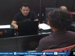 angga-28-seorang-juru-parkir-pembacok-pengamen-bertato.jpg