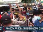 anggota-fpi-sempat-tutup-jalan-saat-disinfektan-dan-tolak-rapid-kapolda-metro-mereka-yang-rugi.jpg
