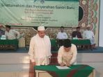 bupati-muratara-syarif-hidayat-menandatangani-serah-terima-santri-tahfidz-alquran_20170721_112709.jpg