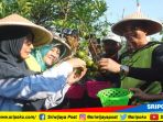 bupati-musiawas-h-hendra-gunawan-dan-istri-dr-hj-noviar-marlina-gunawan_20180924_133714.jpg