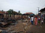 foto-11-rumah-terbakar-di-desa-teluk-kijing-i-kecamatan-lais.jpg