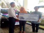 hadiah-mobil-dari-bank-btn-palembang_20180528_211656.jpg