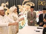 jokowi-tahan-tawa.jpg