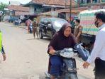 pengendara-motor-tak-pakai-masker.jpg