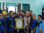 piagam-rakornas-pwi_20180711_200807.jpg