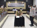 pj-bupati-muara-enim-hnu-melakukan-mou-dengan-kapolda-sumsel.jpg