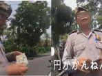 polisi-peras-turis-asing.jpg