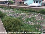 sampah-memenuhi-sungai-bendung-palembang-rabu-9102019.jpg