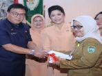 sekda-sumsel-nasrun-umar-pada-peringatan-hut-dharma-wanita-ke-19-provinsi-sumsel-2018.jpg