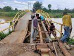 ss-jembatan-rusak-di-oi.jpg