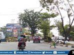 tumpukan-sampah-di-median-jalan-kawasan-jalan-wahid-hasyim-seberang-ulu-i-palembang.jpg