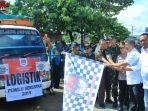 wabup-oku-drs-johan-anuar-sh-mm-saat-melepas-logistik-pemilu-sabtu-1342019.jpg