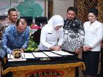 walikota-palembang-h-harnojoyo-melakukan-penandatanganan-kerjasama-antara-polda-sumsel.jpg